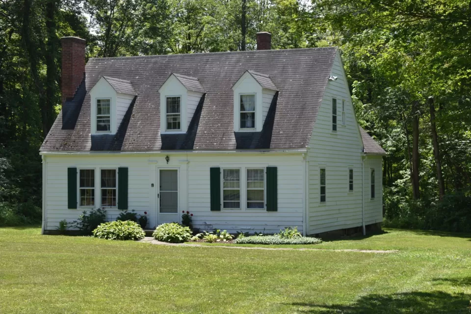 Craftsman-style white kit home from Sears catalog sold in early 20th century